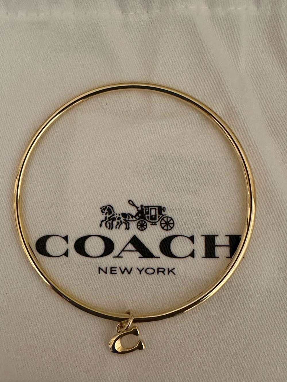 Coach Gold Bangle Bracelet with C Coach Charm